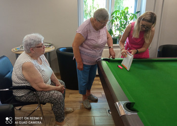 Zdjęcie przedstawia uczestników Klubu Seniora